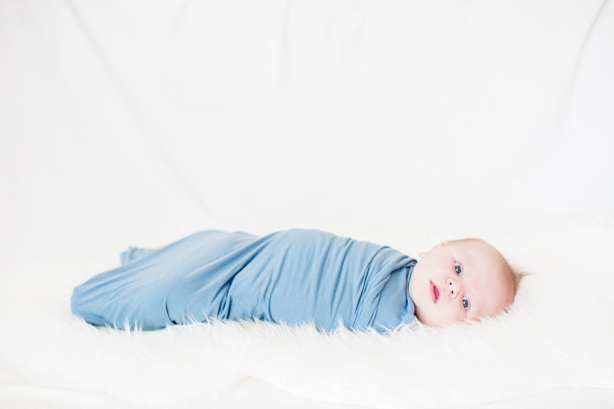 In home family lifestyle and newborn session in Temecula, CA. Family portraits by Jade & Brian Photography.